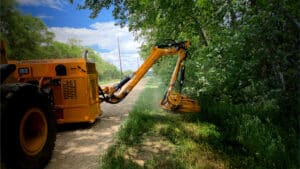 Hydratach mower beside road